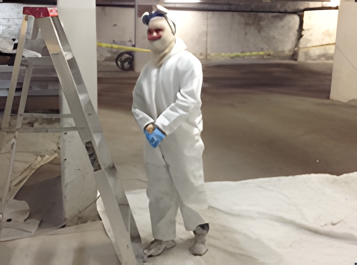Our team at work painting an underground parking garage
